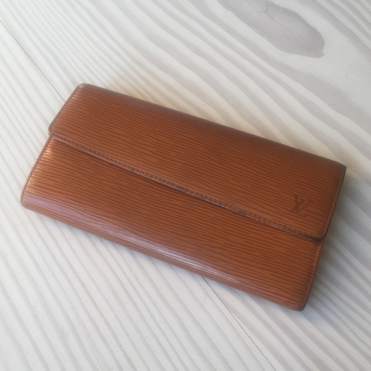 Louis Vuitton Epi Geldbörse aus Leder – Eleganz in zeitlosem Cognac.