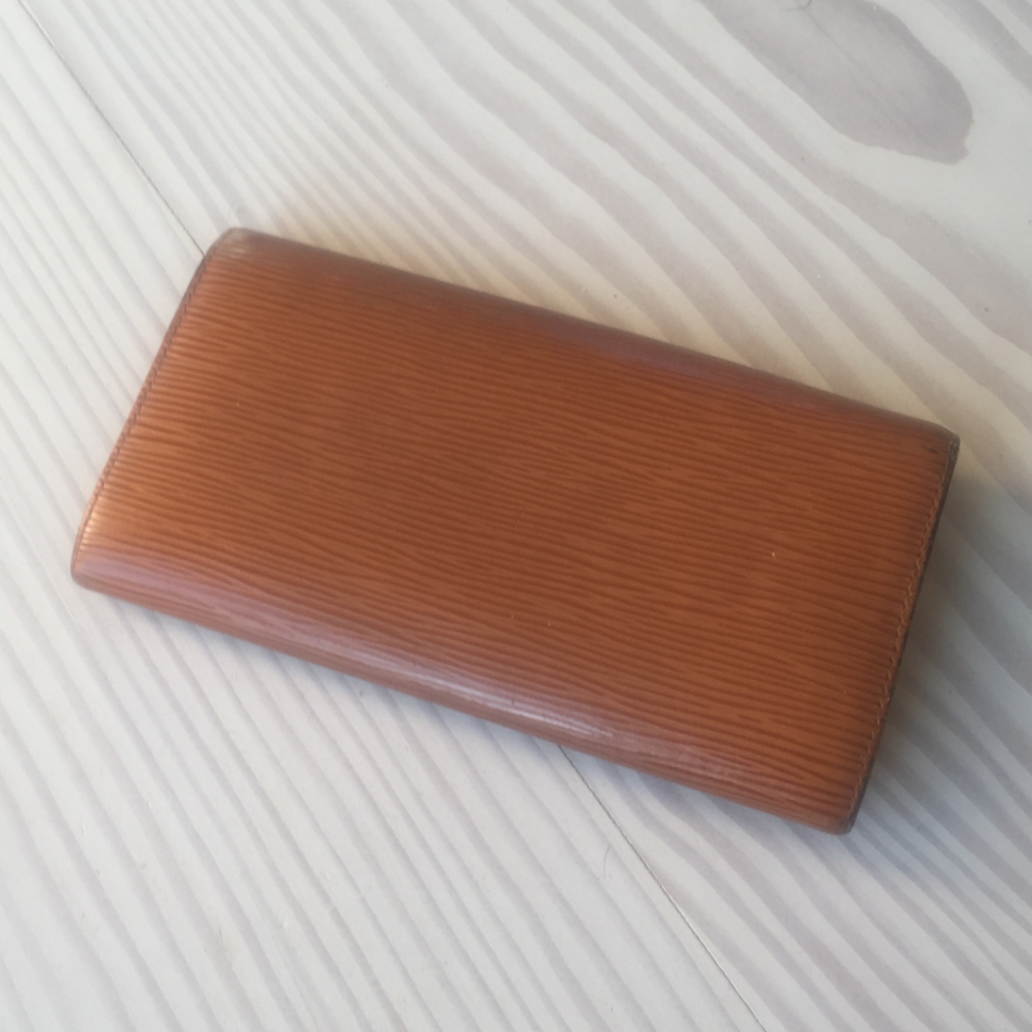 Louis Vuitton Epi Geldbörse aus Leder – Eleganz in zeitlosem Cognac.